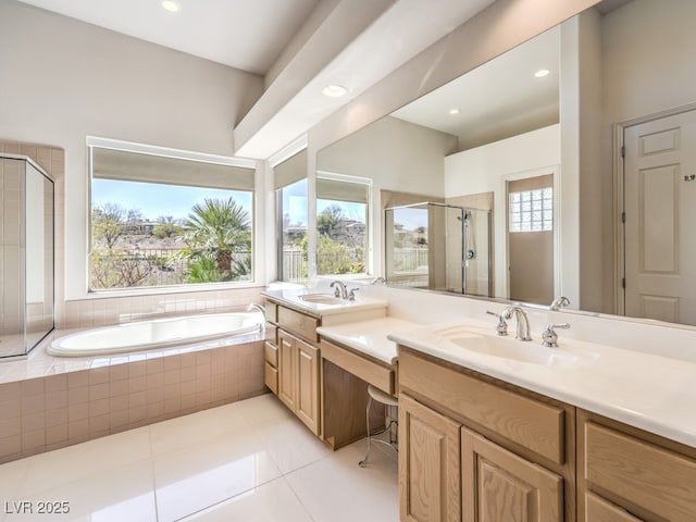 bathroom featuring tile patterned flooring, a garden tub, recessed lighting, vanity, and a stall shower