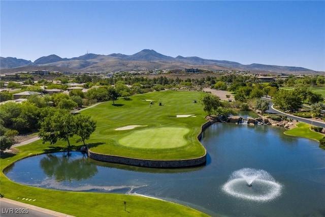 surrounding community with view of golf course and a water and mountain view