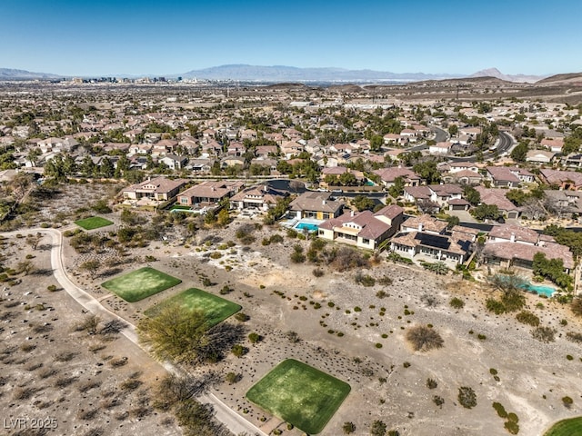 bird's eye view with a mountain view and a residential view