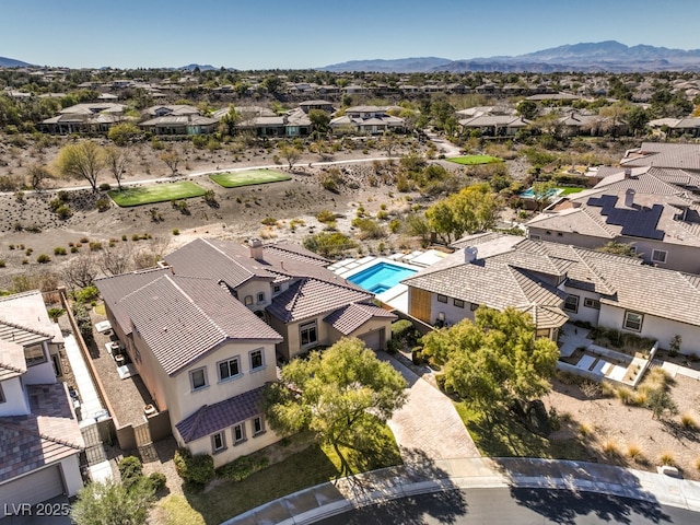 aerial view featuring a residential view and a mountain view