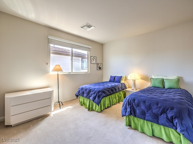 carpeted bedroom with visible vents