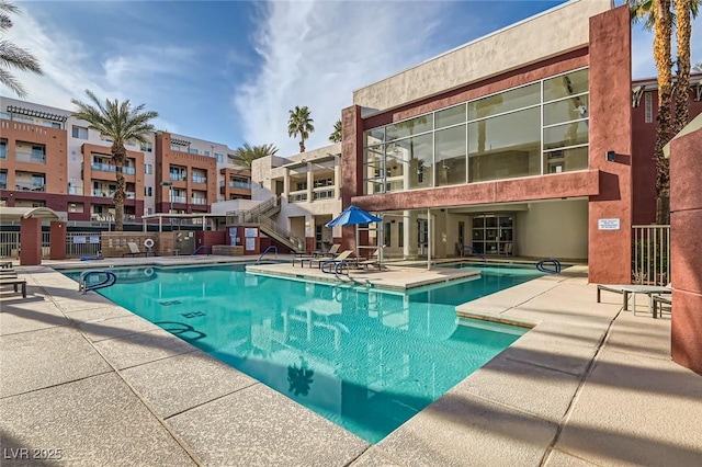 pool with a patio