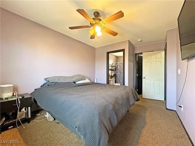 bedroom with a ceiling fan and carpet flooring