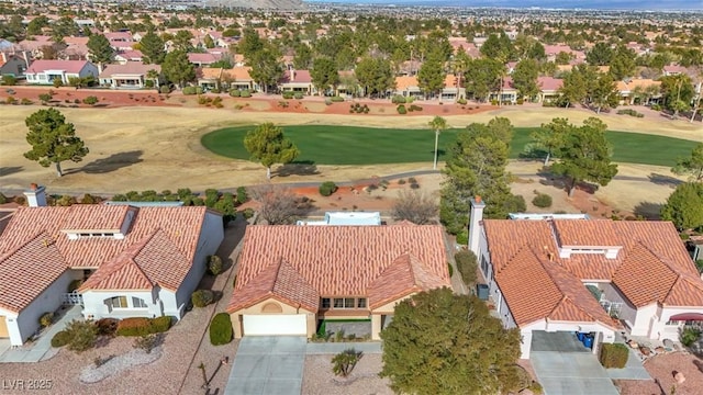 bird's eye view with a residential view and golf course view