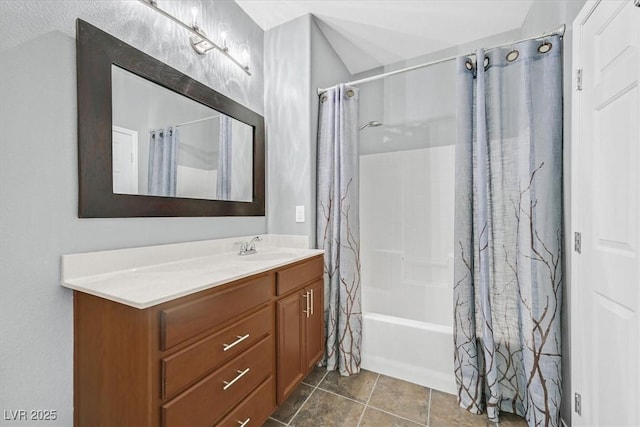 bathroom featuring shower / bath combo with shower curtain and vanity