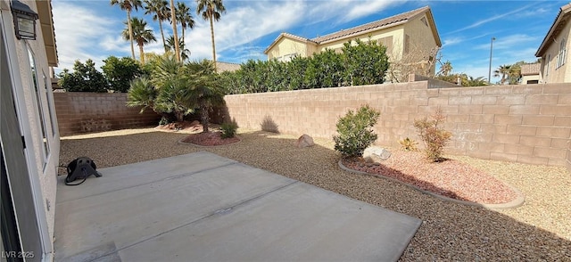 view of patio with a fenced backyard