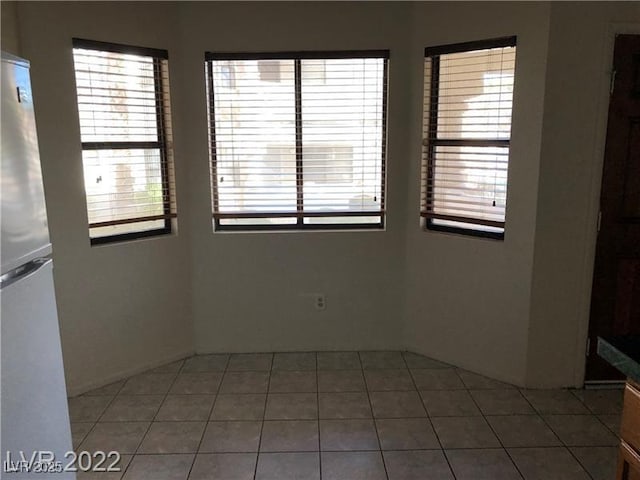 view of tiled spare room