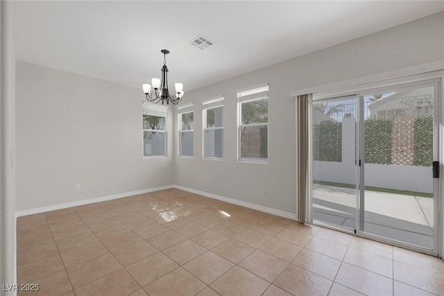 unfurnished room featuring light tile patterned floors, baseboards, visible vents, and a chandelier