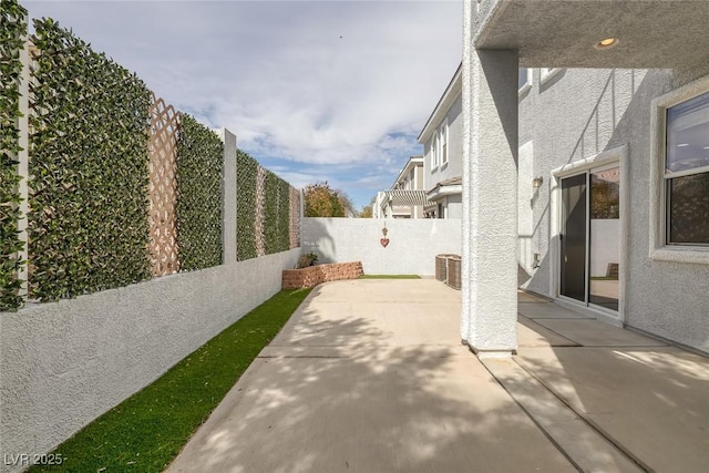 view of patio with a fenced backyard