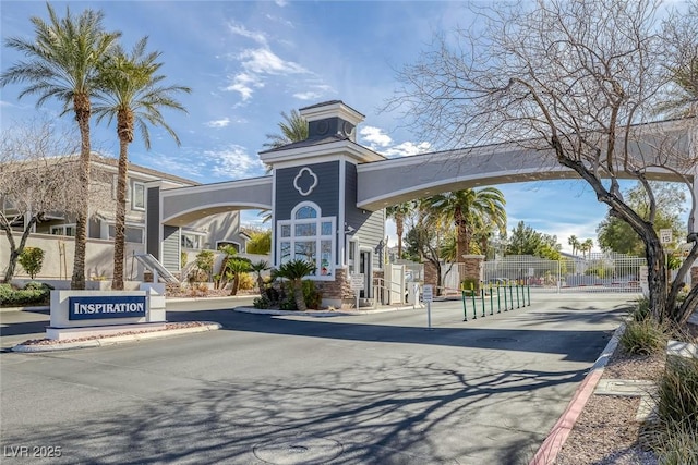 view of property with fence