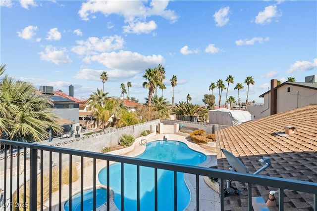 view of swimming pool featuring a patio area, a fenced backyard, and a fenced in pool