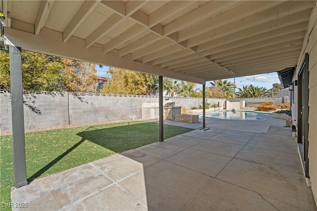 view of patio / terrace with a fenced backyard and a fenced in pool