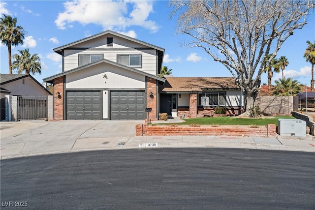 traditional-style house with driveway, a garage, fence, and brick siding