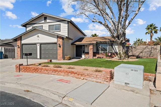 view of front of home featuring driveway, brick siding, a front lawn, and fence