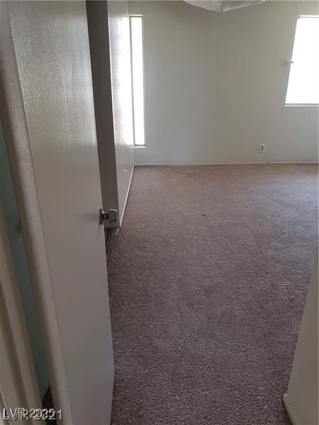 empty room featuring carpet