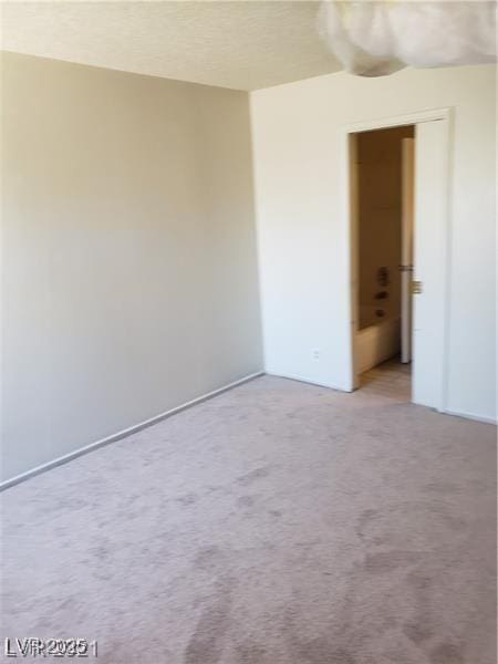 spare room with carpet floors