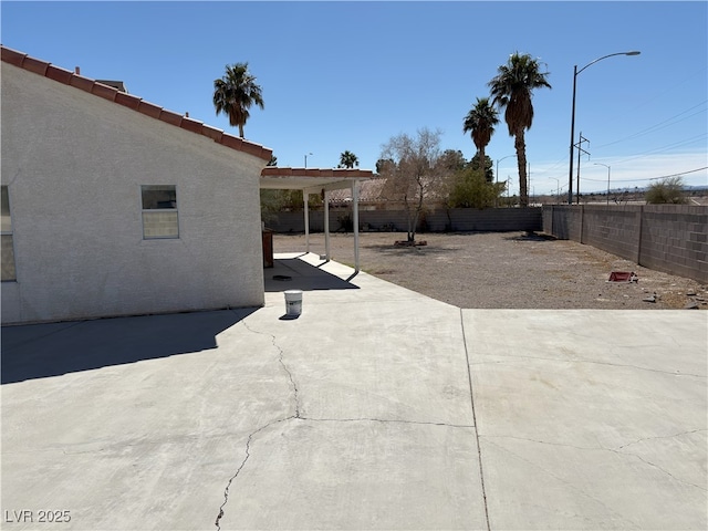 view of patio featuring a fenced backyard