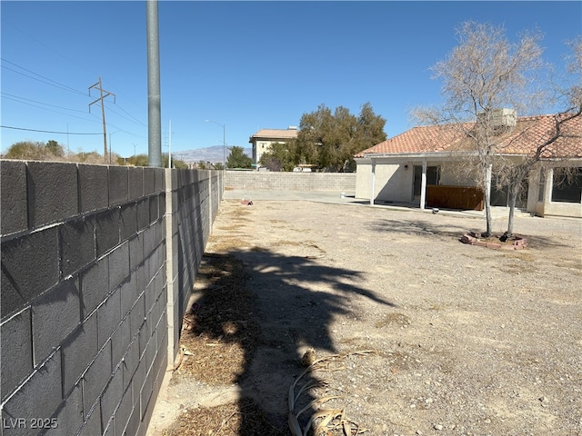 view of yard with a fenced backyard