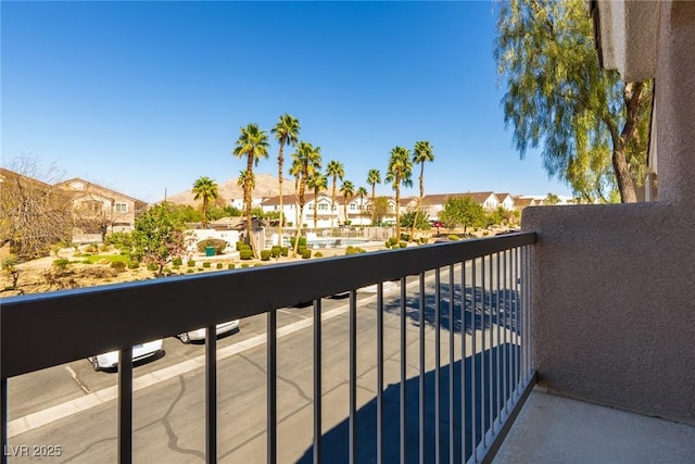 balcony featuring a residential view