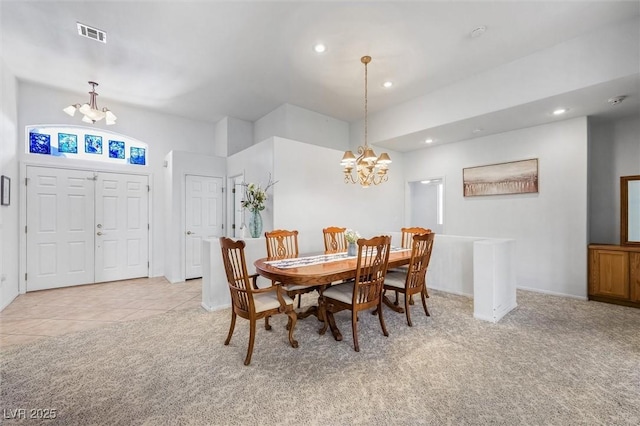 dining room with visible vents, recessed lighting, light colored carpet, and an inviting chandelier