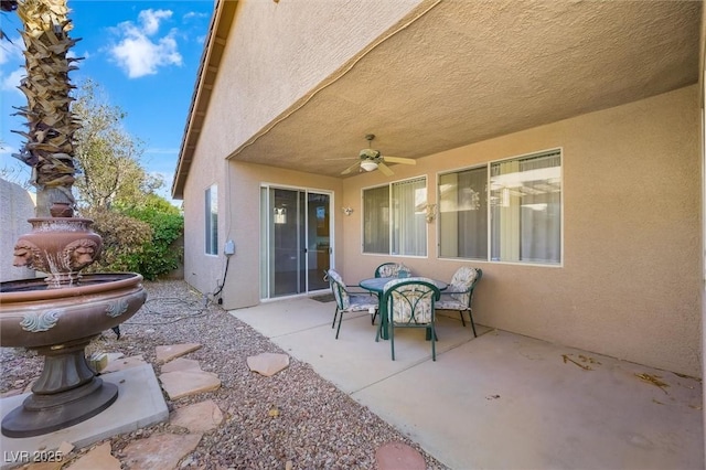 view of patio with ceiling fan