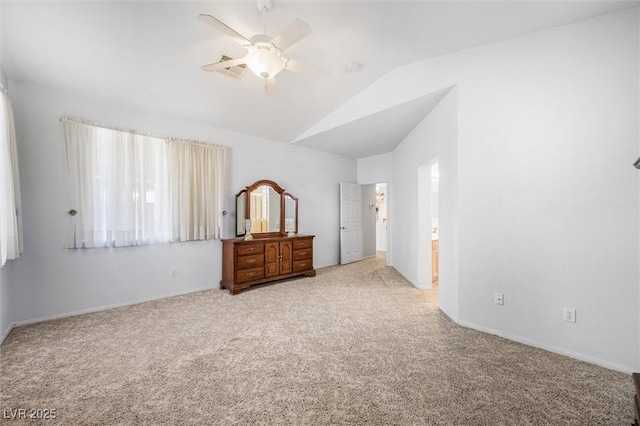 bedroom with lofted ceiling, ceiling fan, and light carpet