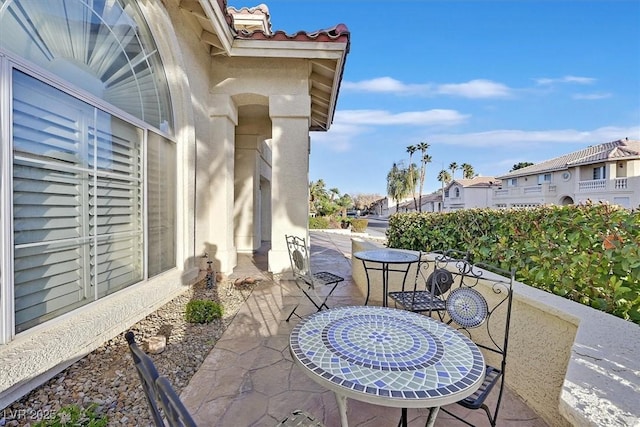 view of patio / terrace with a residential view