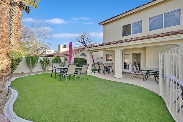 view of yard featuring a patio area and fence