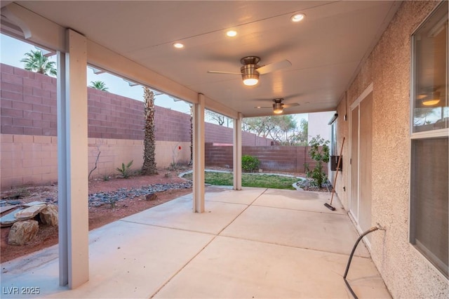 view of patio / terrace with ceiling fan and a fenced backyard