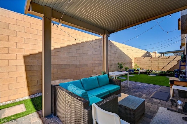 6747 Marjoram St, Las Vegas, NV 89166 - view of patio featuring outdoor lounge area and a fenced backyard
