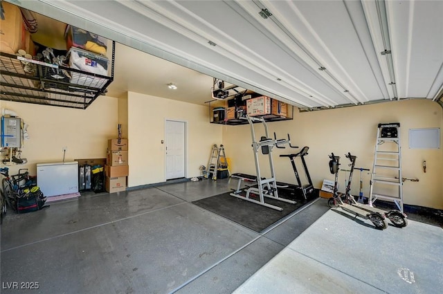 6747 Marjoram St, Las Vegas, NV 89166 - garage with white refrigerator