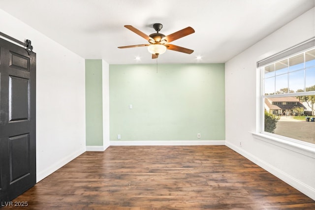 spare room featuring ceiling fan, recessed lighting, wood finished floors, and baseboards