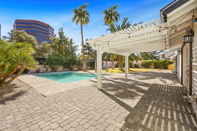 view of pool with a patio, a fenced backyard, a fenced in pool, and a pergola