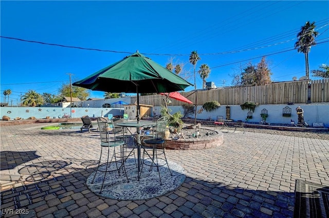 view of patio with a fenced backyard