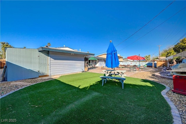 view of yard with a patio area and fence