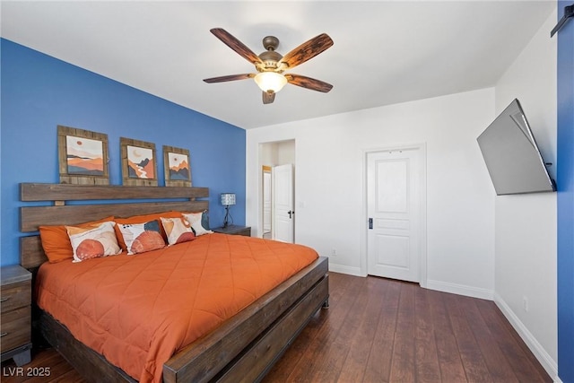 bedroom featuring baseboards, ceiling fan, and hardwood / wood-style floors