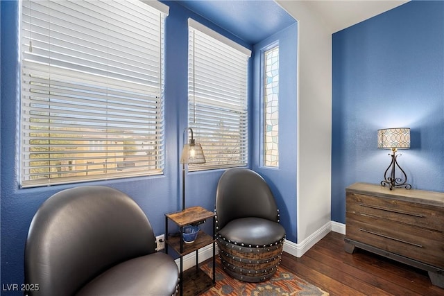 sitting room featuring wood finished floors and baseboards