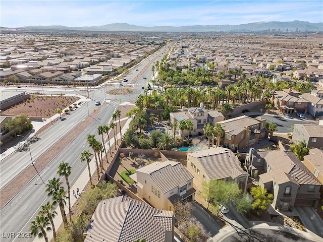 birds eye view of property featuring a mountain view and a residential view