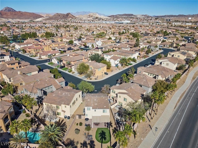 aerial view with a mountain view and a residential view