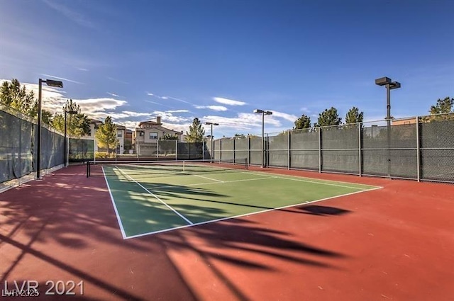 view of sport court with community basketball court and fence