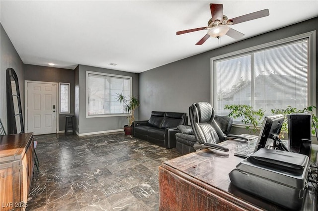 office area featuring marble finish floor, a ceiling fan, visible vents, and baseboards