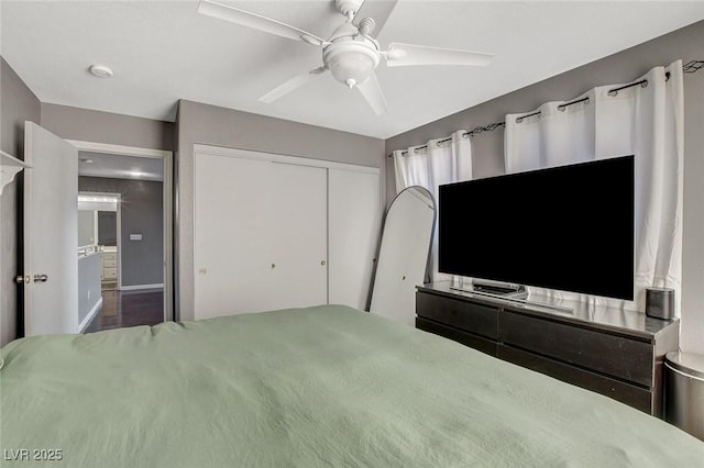 unfurnished bedroom with a closet and a ceiling fan