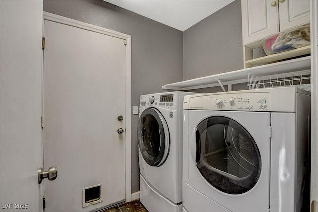 washroom with laundry area and washing machine and clothes dryer