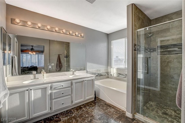 full bathroom with marble finish floor, a sink, a bath, and a shower stall