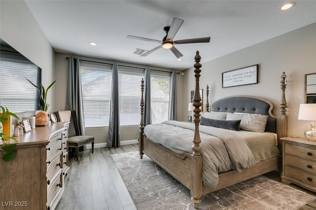 bedroom featuring recessed lighting, visible vents, a ceiling fan, light wood-type flooring, and baseboards