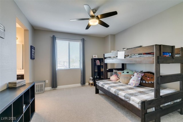 bedroom featuring ceiling fan, carpet floors, connected bathroom, and baseboards