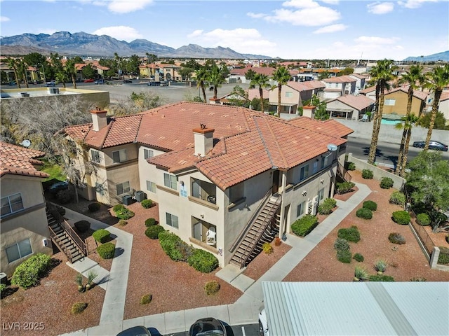 birds eye view of property featuring a residential view and a mountain view