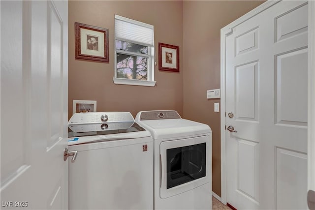 laundry area featuring laundry area and washer and clothes dryer