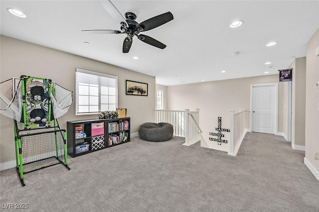 recreation room featuring baseboards, carpet, and recessed lighting