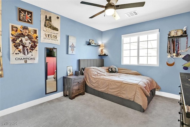 carpeted bedroom featuring visible vents, ceiling fan, and baseboards